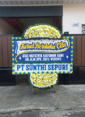 Papan Bunga Duka di Wek Ii