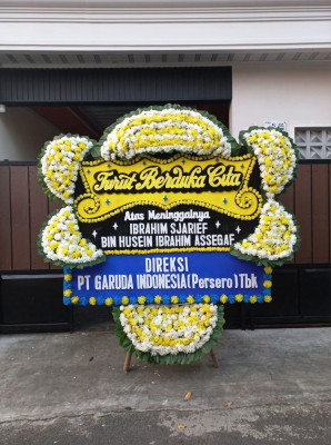 Papan Bunga Duka di Wek Ii