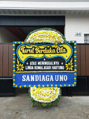 Papan Bunga Duka di Wek Ii